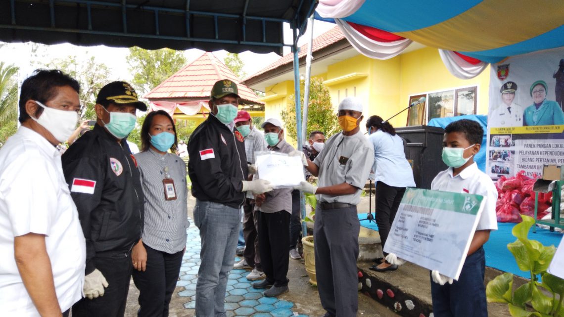 577 Masyarakat di Telutih-Malteng Terima KIS